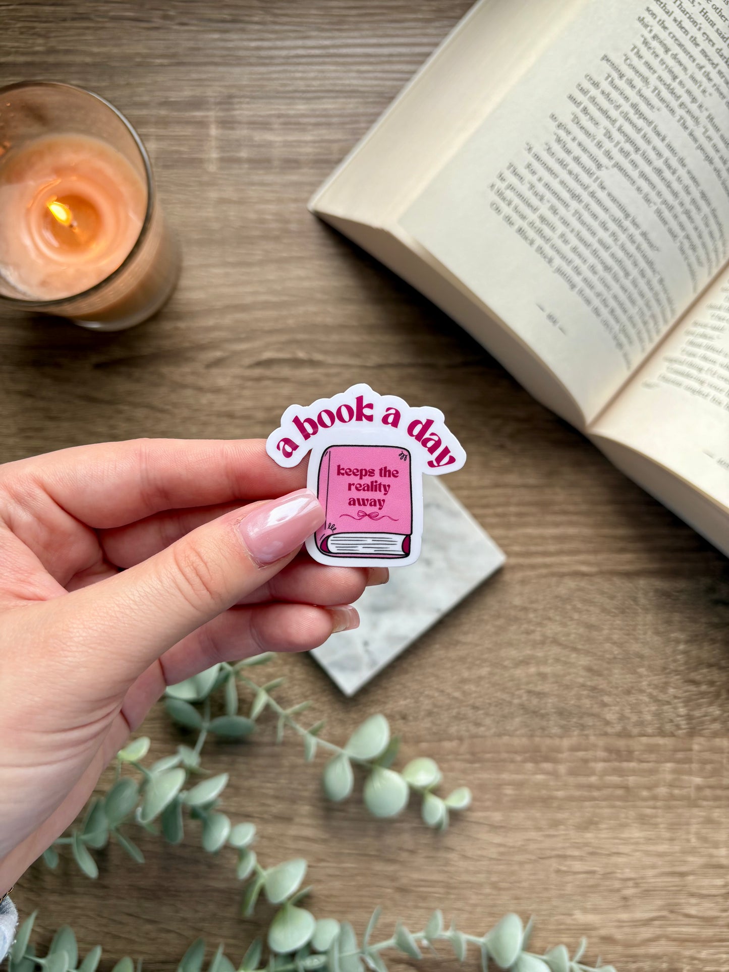 A Book A Day Keeps The Reality Away Sticker